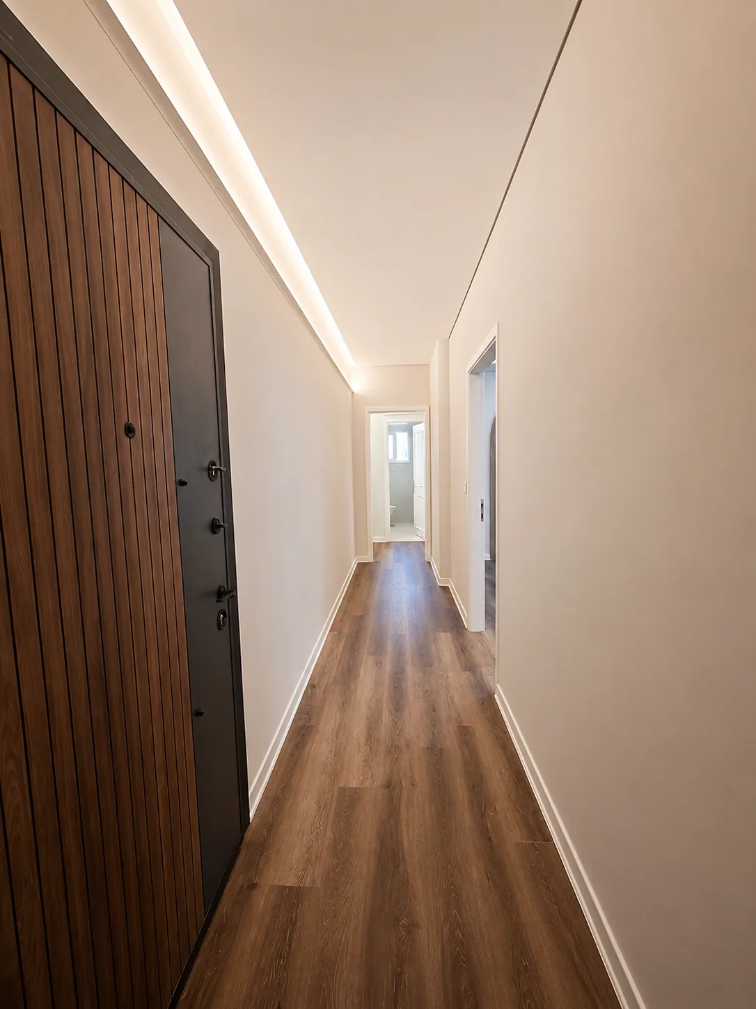 LED Cove Entry Hallway — chic corners renovation in Clemenceau by K.Renovation