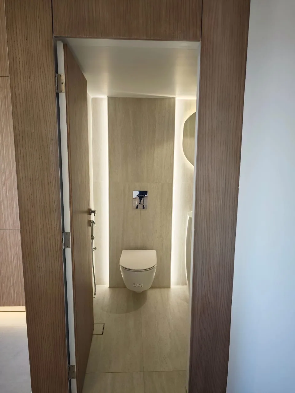 Travertine Backlit WC — bathrooms renovation in ELYSSAR by K.Renovation