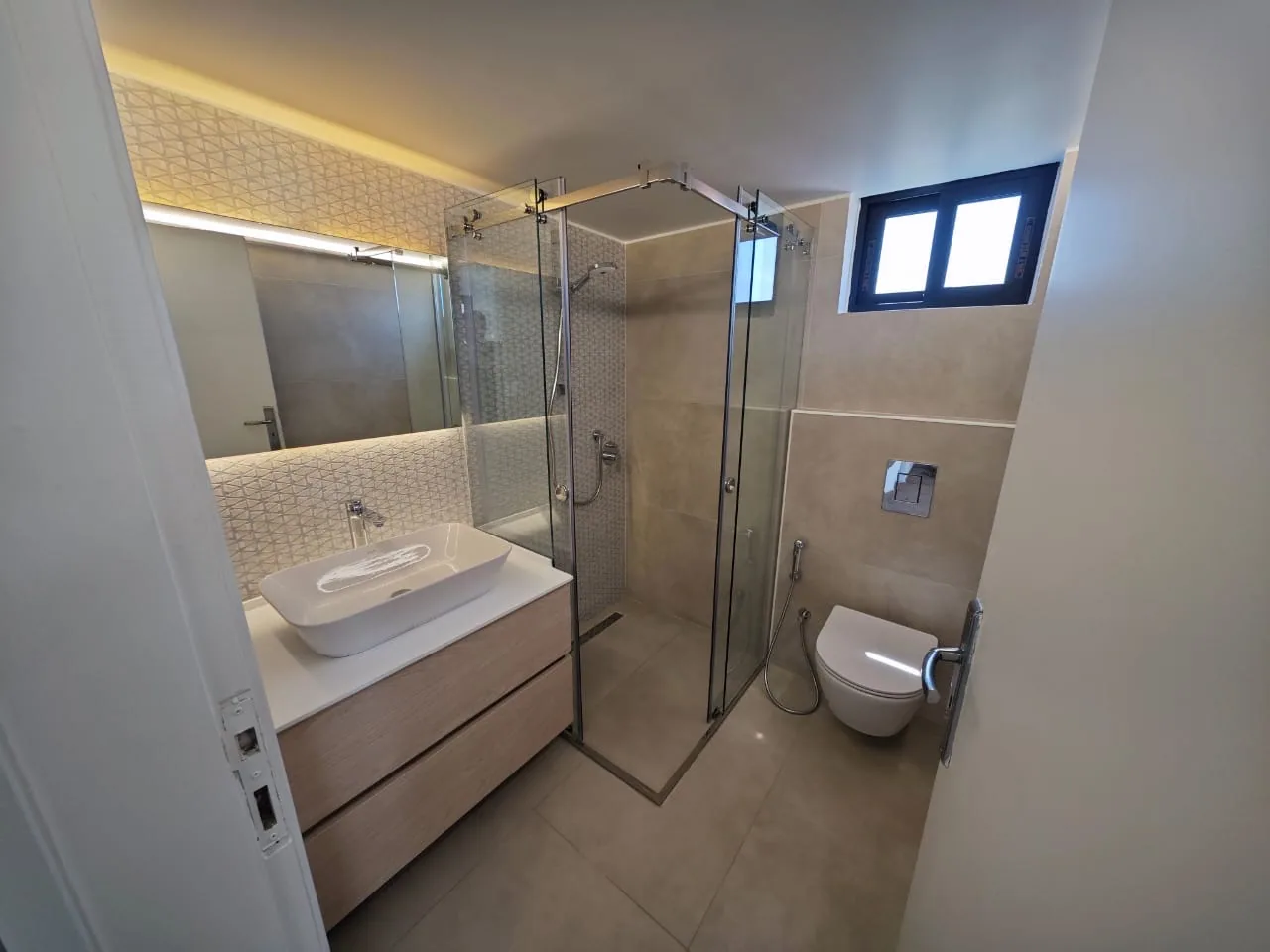 Geo Mosaic Glass Shower — bathrooms renovation in BATROUN by K.Renovation