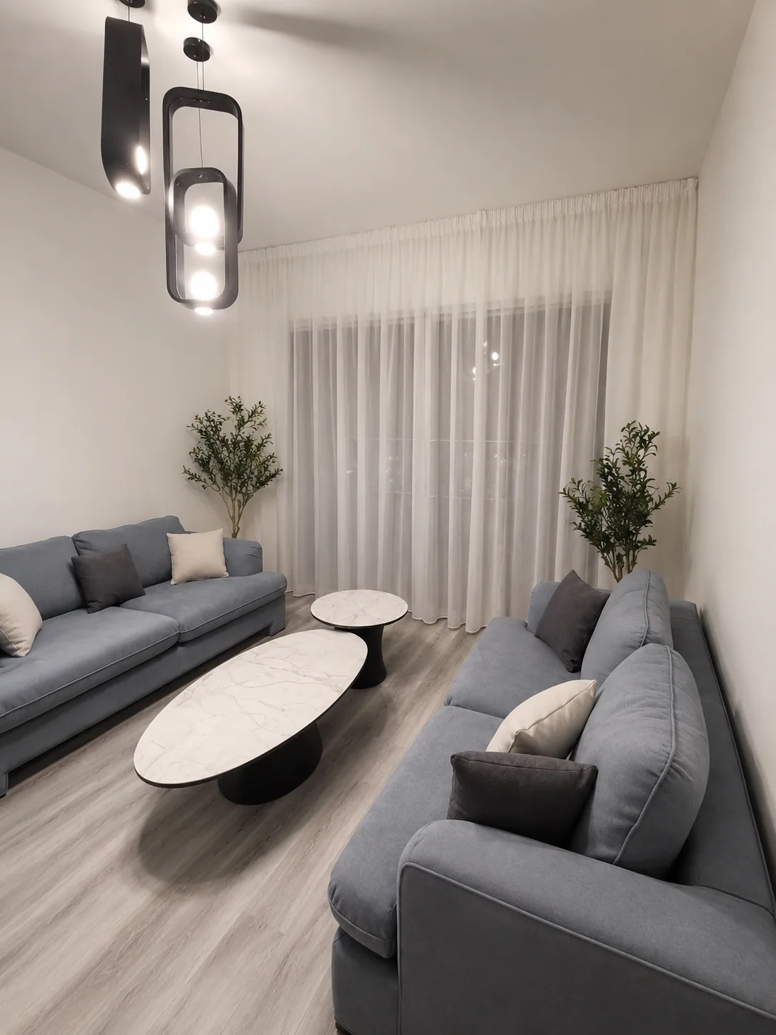 Dusk Blue Twin Sofa Lounge — living rooms renovation in ELYSSAR by K.Renovation