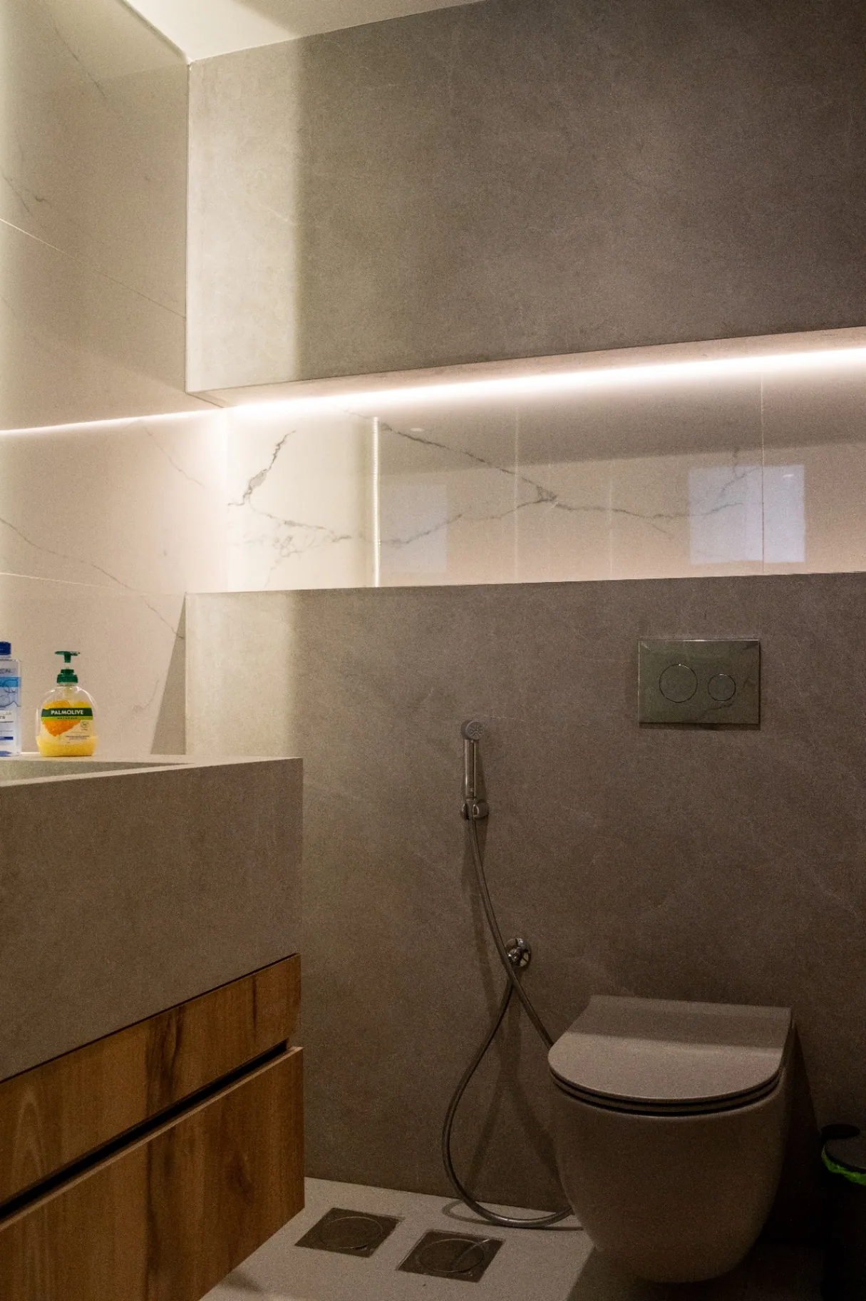 Stone Backlit Niche Powder Room — bathrooms renovation in ELYSSAR by K.Renovation